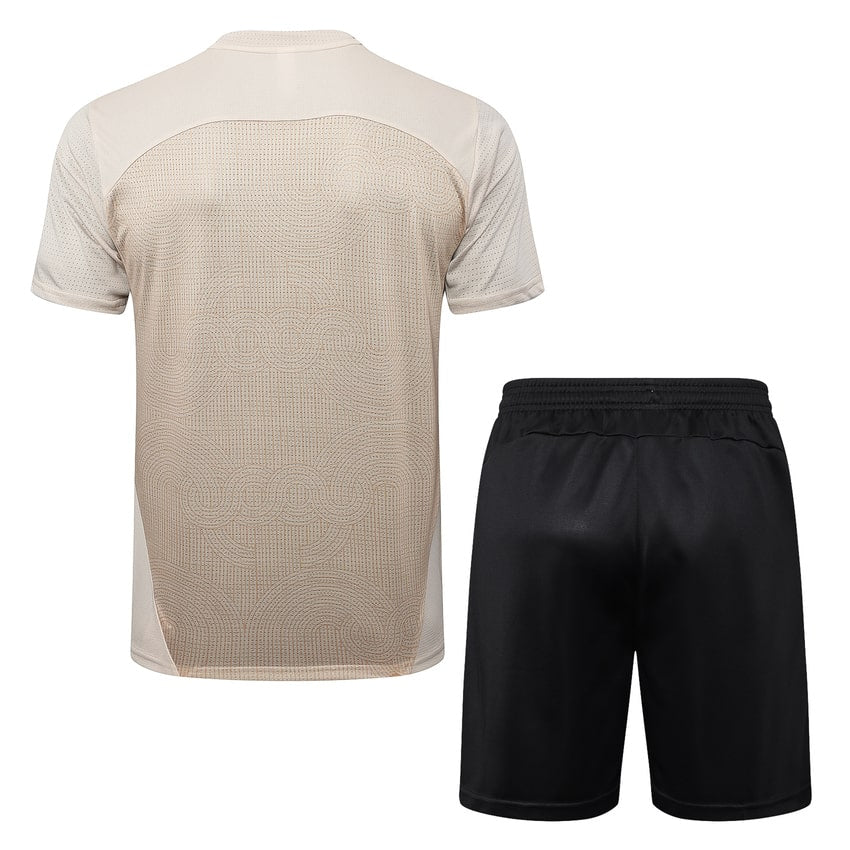 Conjunto de camiseta y pantalón corto del AC Milan para hombre 2024-2025 beige | Fútbol