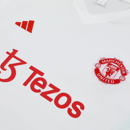 Maillot-Entrainement-Manchester-United-Blanc-Homme-2023-2024-2