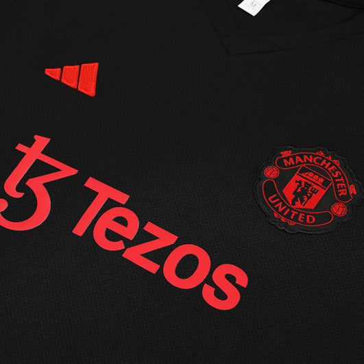 Maillot-Entrainement-Manchester-United-Noir-Homme-2023-2024-2